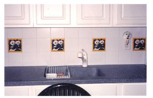 KITCHEN BACKSPLASH USING A CUSTOM PANDA TILE MADE EXPRESSLY FOR THE NATIONAL ZOO